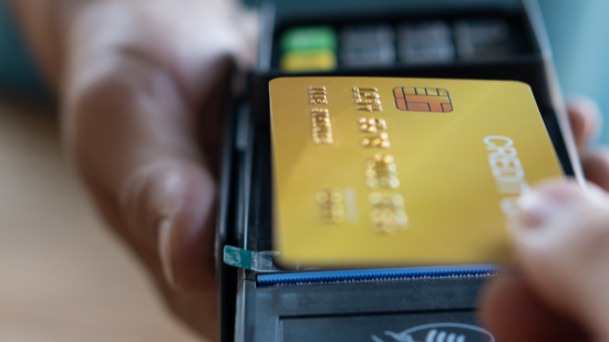Pay at the store with a card reader.